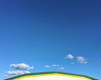 Low angle view of building against blue sky
