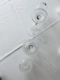 High angle view of glass of water on table