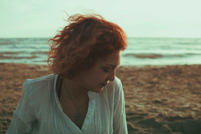 Woman standing on beach