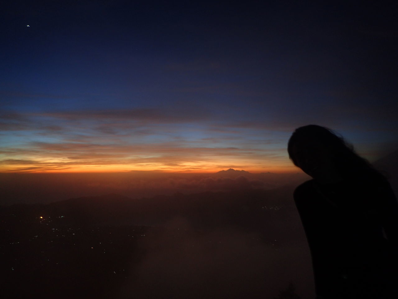 SILHOUETTE OF MAN AGAINST SKY