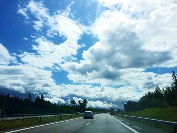 Country road passing through landscape