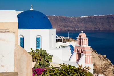 Traditional architecture of the churches of the oia city in santorini island