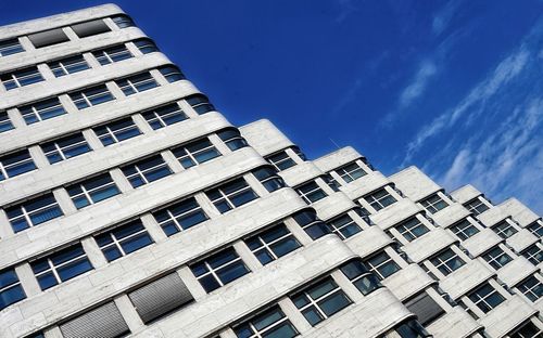 Low angle view of building against blue sky