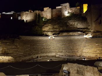 View of illuminated city at night