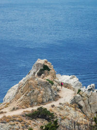 High angle view of rocks on beach in monte enfola of elba island in italy