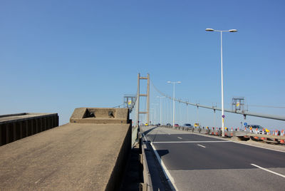 View of bridge against clear blue sky