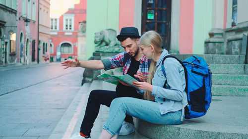 Portrait of young woman using mobile phone