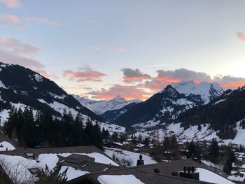 Scenic view of mountains against sky during winter