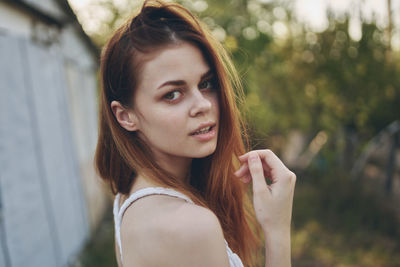 Portrait of smiling young woman