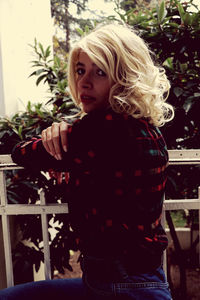 Portrait of girl standing outdoors