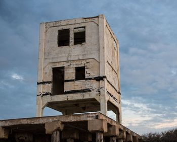 Low angle view of old building against sky