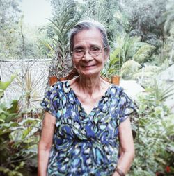 Portrait of senior woman in garden