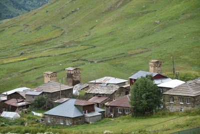 High angle view of houses on field