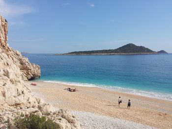 Scenic view of sea against blue sky