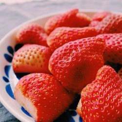 Close-up of strawberries in plate on table