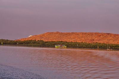 Scenic view of land against clear sky