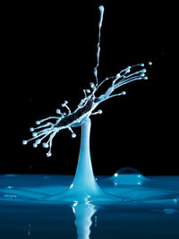 Close-up of water over black background