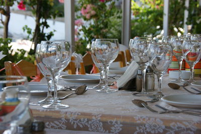 Wine glasses on table at restaurant