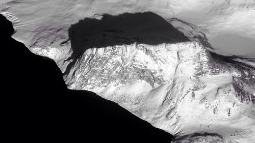 Scenic view of snow covered mountains