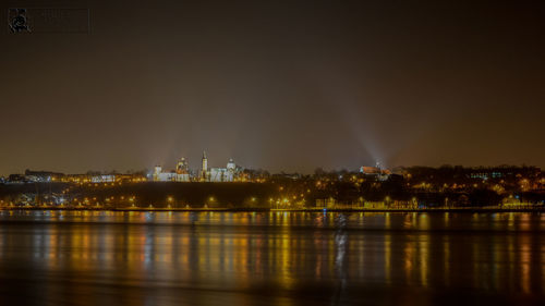 Illuminated cityscape at night