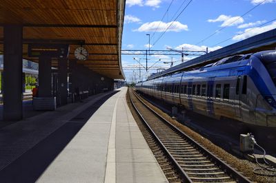 Railroad station platform against sky