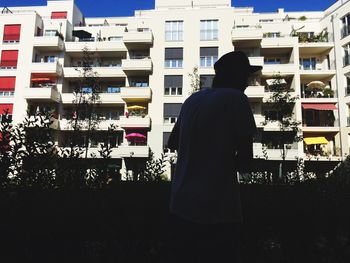 Woman standing in city