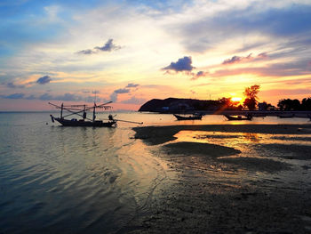 Scenic view of sea at sunset