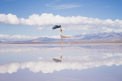 Dancing girl in the salt flat