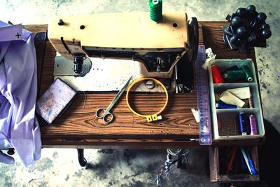 High angle view of old objects on table