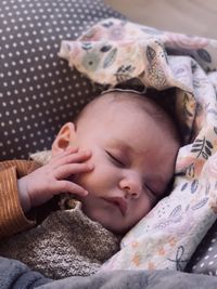 Cute baby sleeping on bed