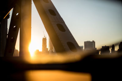 Buildings against sky during sunset