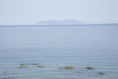 Scenic view of sea against clear sky