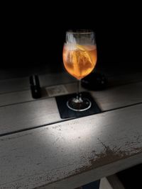 Close-up of beer glass on table