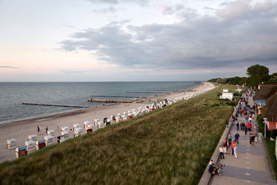 High angle view of people on beach against sky