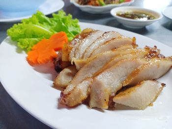 High angle view of fish served in plate on table