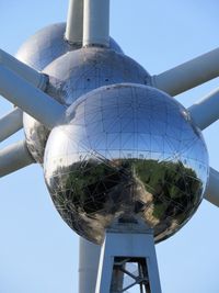 Low angle view of metal structure against sky