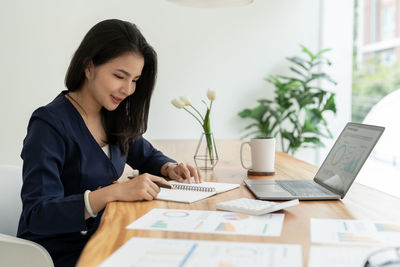 Businesswoman working at office