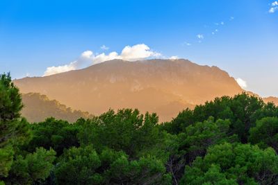 Scenic view of mountains against sky during sunset