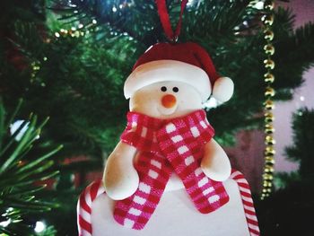 Close-up of hand holding christmas tree