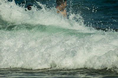 Sea waves splashing on shore