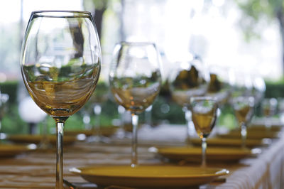 Close-up of wineglass on table