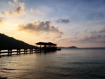 Scenic view of sea against sky at sunset