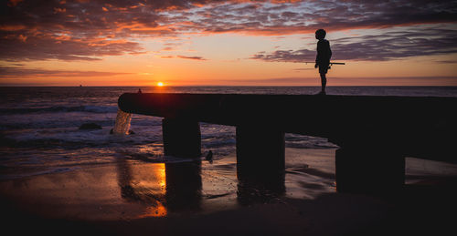 Scenic view of sea at sunset