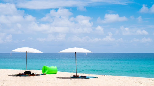 Scenic view of beach against sky