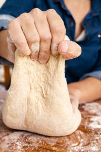 Close-up of person preparing food