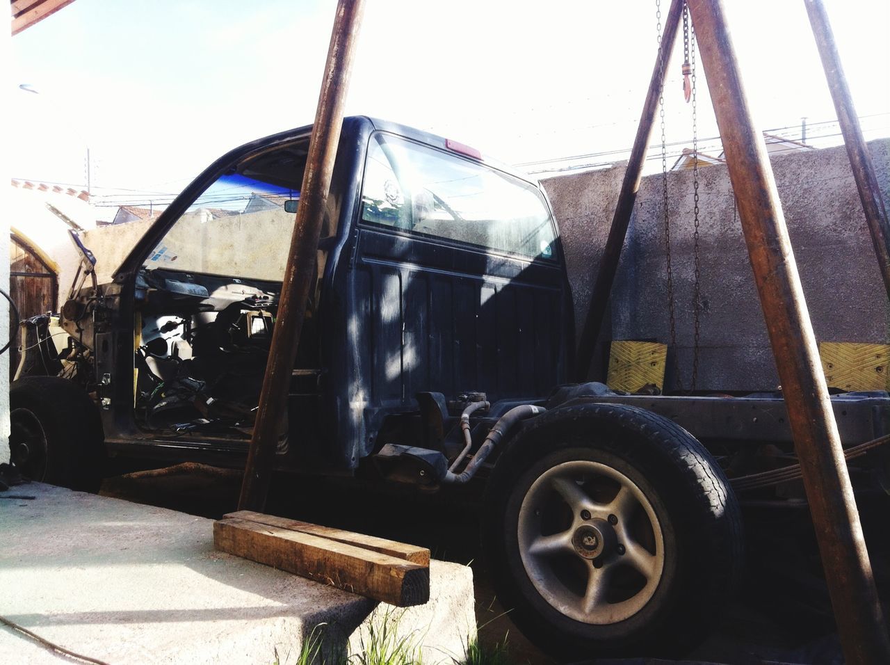 transportation, mode of transport, land vehicle, metal, abandoned, sunlight, damaged, old-fashioned, old, car, obsolete, day, wheel, close-up, no people, sky, metallic, outdoors, part of, built structure