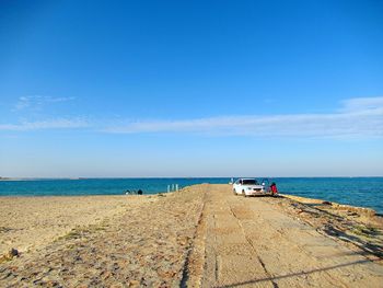 Scenic view of beach against sky