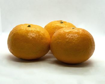 Close-up of orange fruit on table