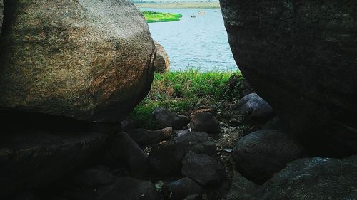 Close-up of pebbles in water