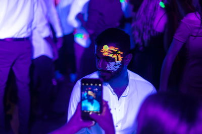 Rear view of people at music concert